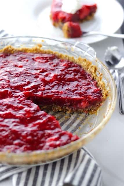 fresh strawberry pie with an oatmeal cookie crust in a pie pan