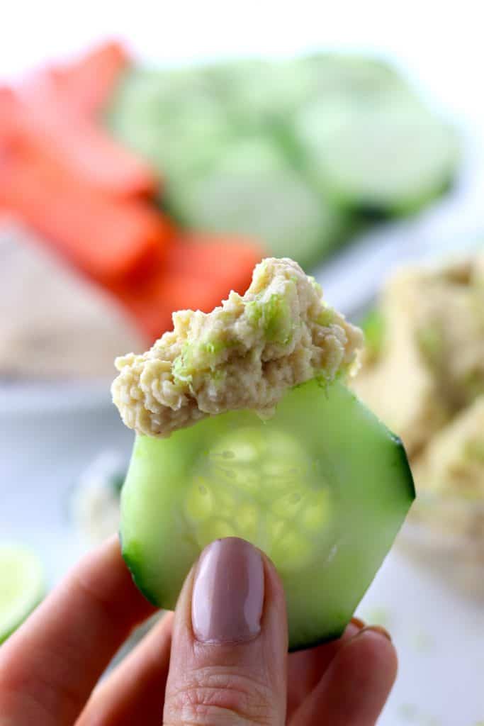 Simple garlic and lime hummus on a cucumber slice