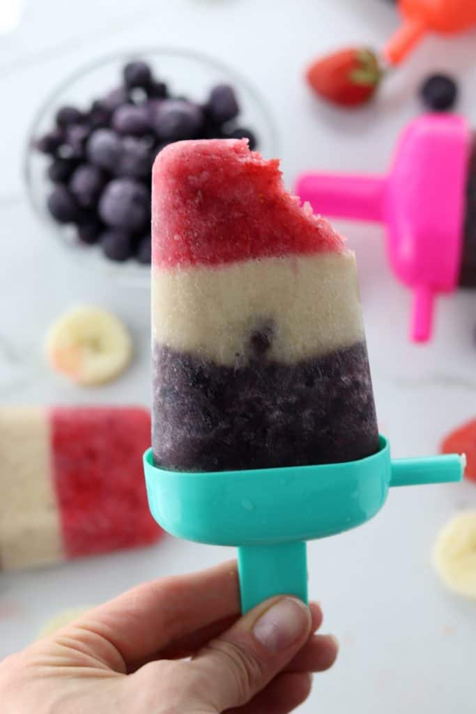 red white and blue fruit pop bitten