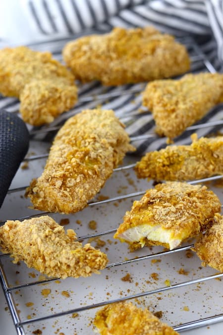 Baked Turmeric Chicken Tenders on a cooling rack