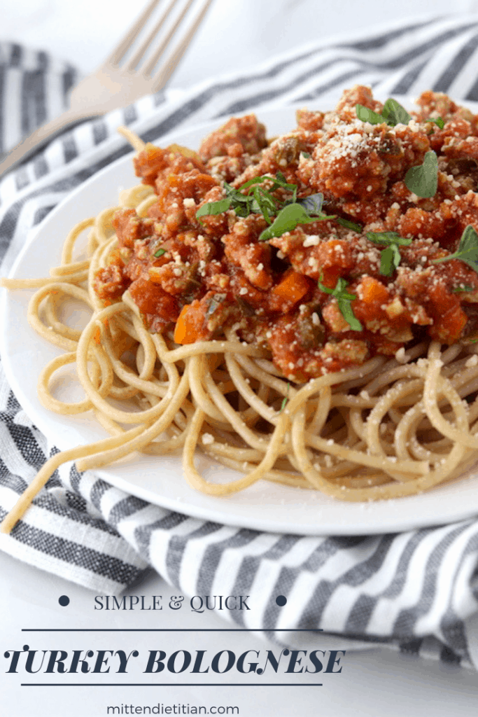 This simple & quick turkey bolognese is a great healthy weeknight dinner. It's low fat, loaded with veggies and high protein!