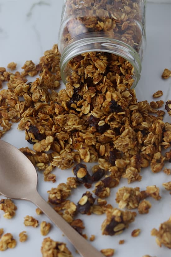 cinnamon date granola spilled on counter