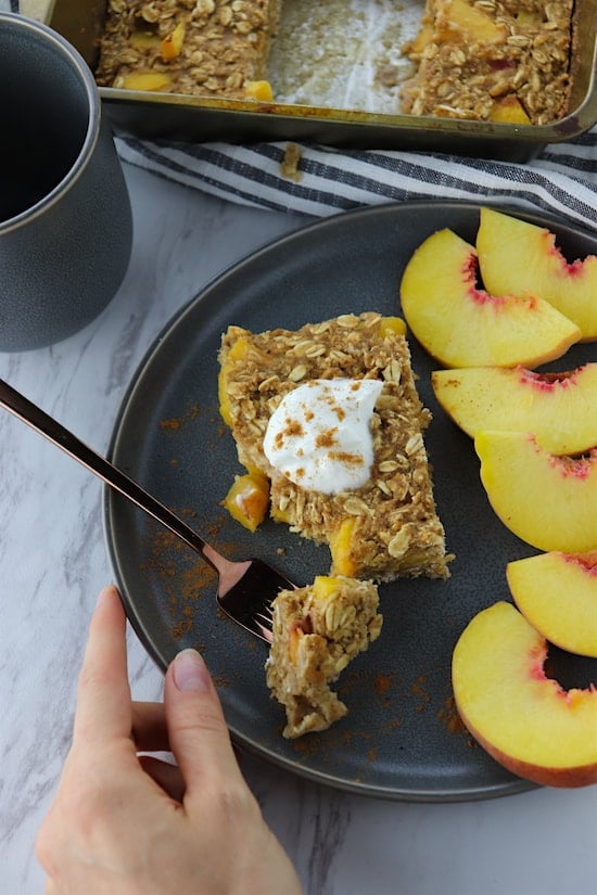 cinnamon peach baked oatmeal being served