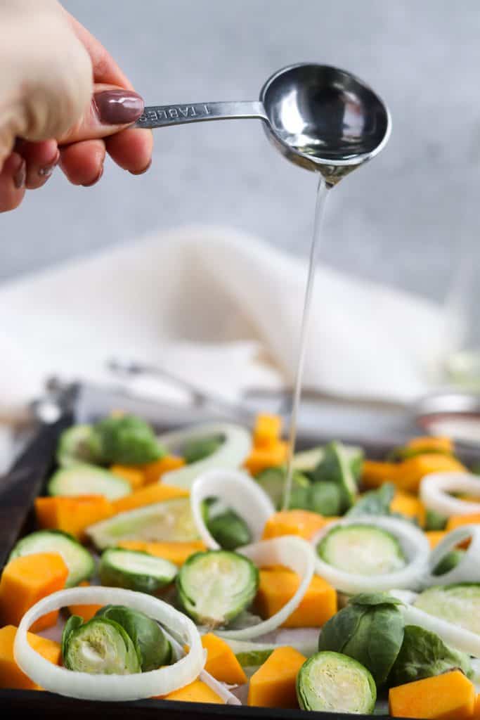 This sheet pan butternut, brussels, and sausage dinner will be your weeknight life saver! Quick, easy and next to no dishes!