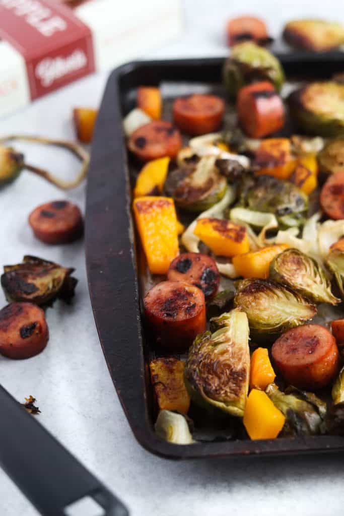 This sheet pan butternut, brussels, and sausage dinner will be your weeknight life saver! Quick, easy and next to no dishes!