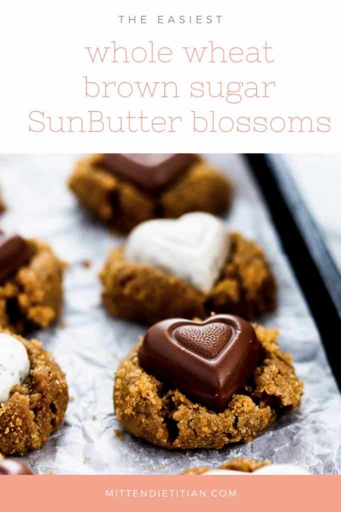 These simple whole wheat brown sugar SunButter blossoms with knock your socks off!! They're perfect for Valentine's day when you use a chocolate heart! #valentinesday #valentinestreat #cookierecipe #blossomcookie