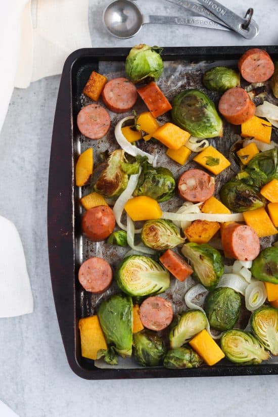 This sheet pan butternut, brussels, and sausage will be your weeknight life saver! Quick, easy, and next to no dishes!
