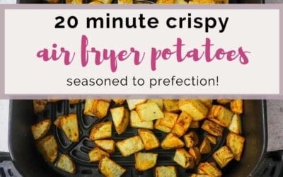 A basket air fryer, with potato cubes inside. The text overlay reads: 20 minute crispy air fryer potatoes.