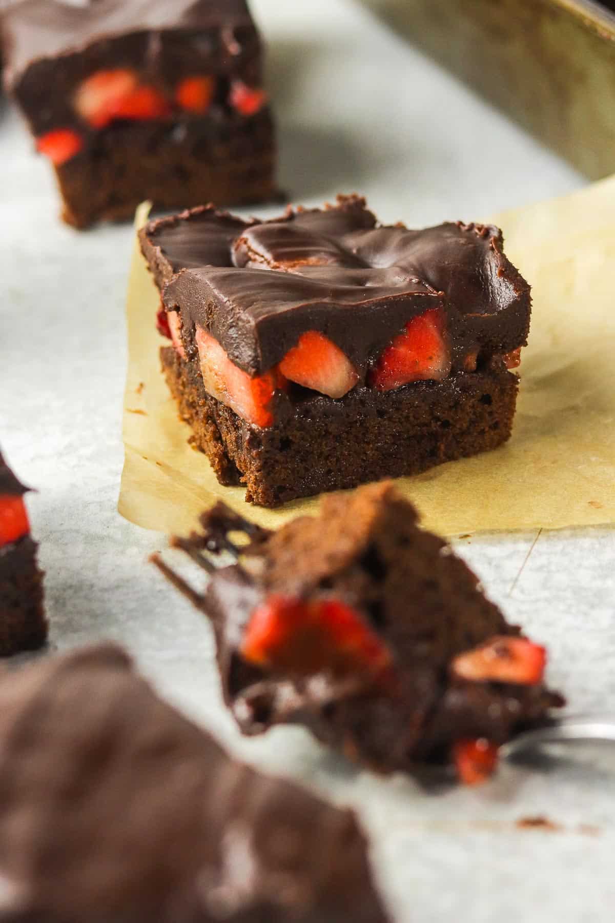 chocolate covered strawberry brownie on the counter.
