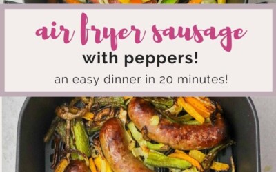 An air fryer basket with peppers and sausage.