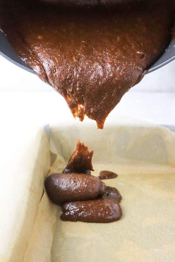 pouring batter for bakery brownies