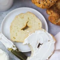 3 ingredient bagel cut in half with cream cheese.