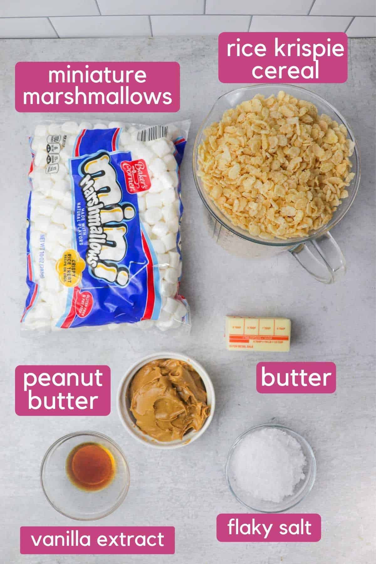 The ingredients needed to make peanut butter rice krispie treats, including marshmallows, peanut butter, and rice cereal.