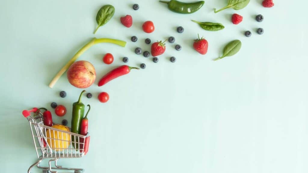 veggies coming out of a cart budget meal planning