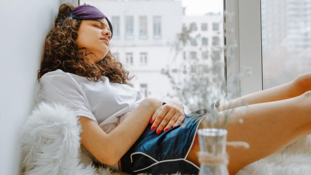 woman feeling bloated after eating