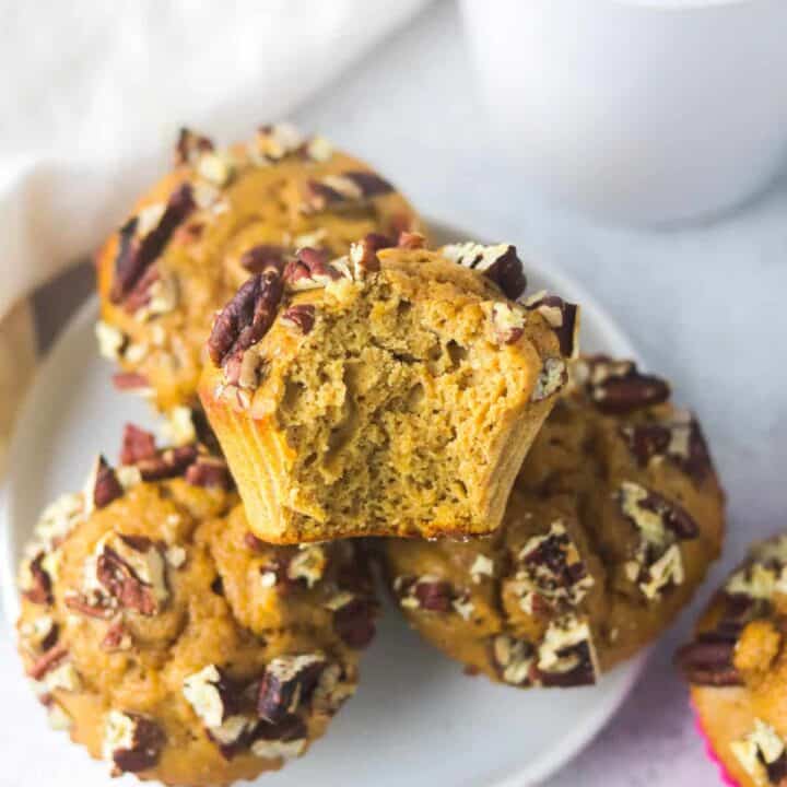 easy pumpkin protein muffins on a plate
