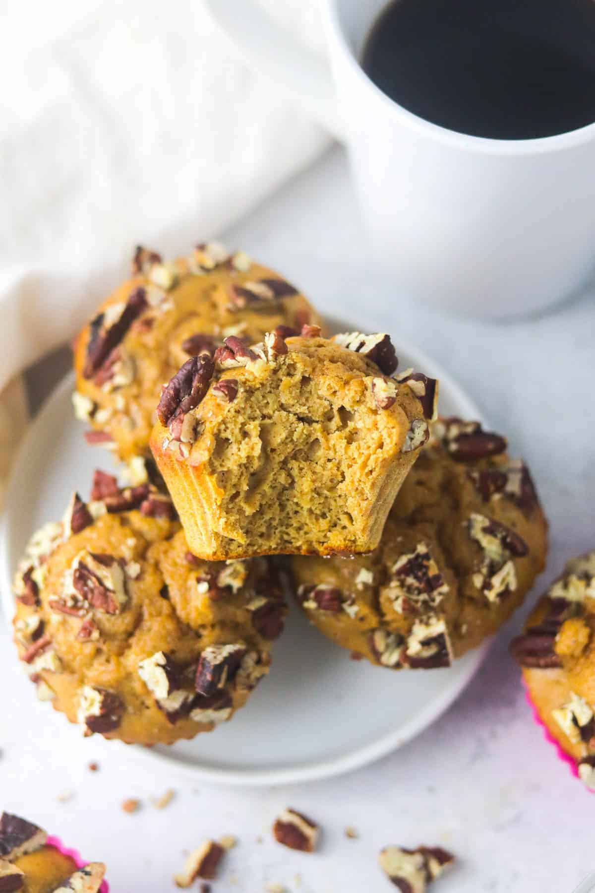 easy pumpkin protein muffins on a plate