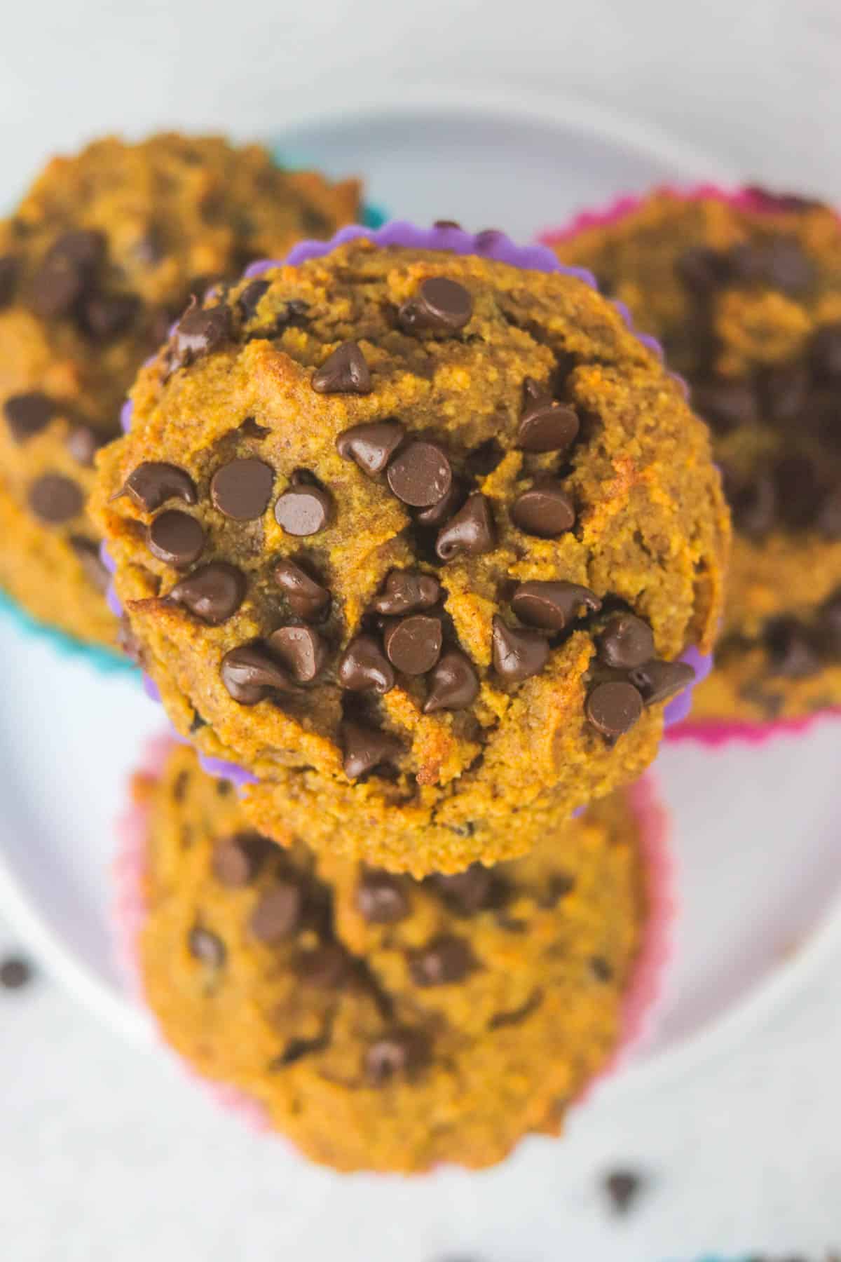 Stacked gluten free pumpkin muffins.