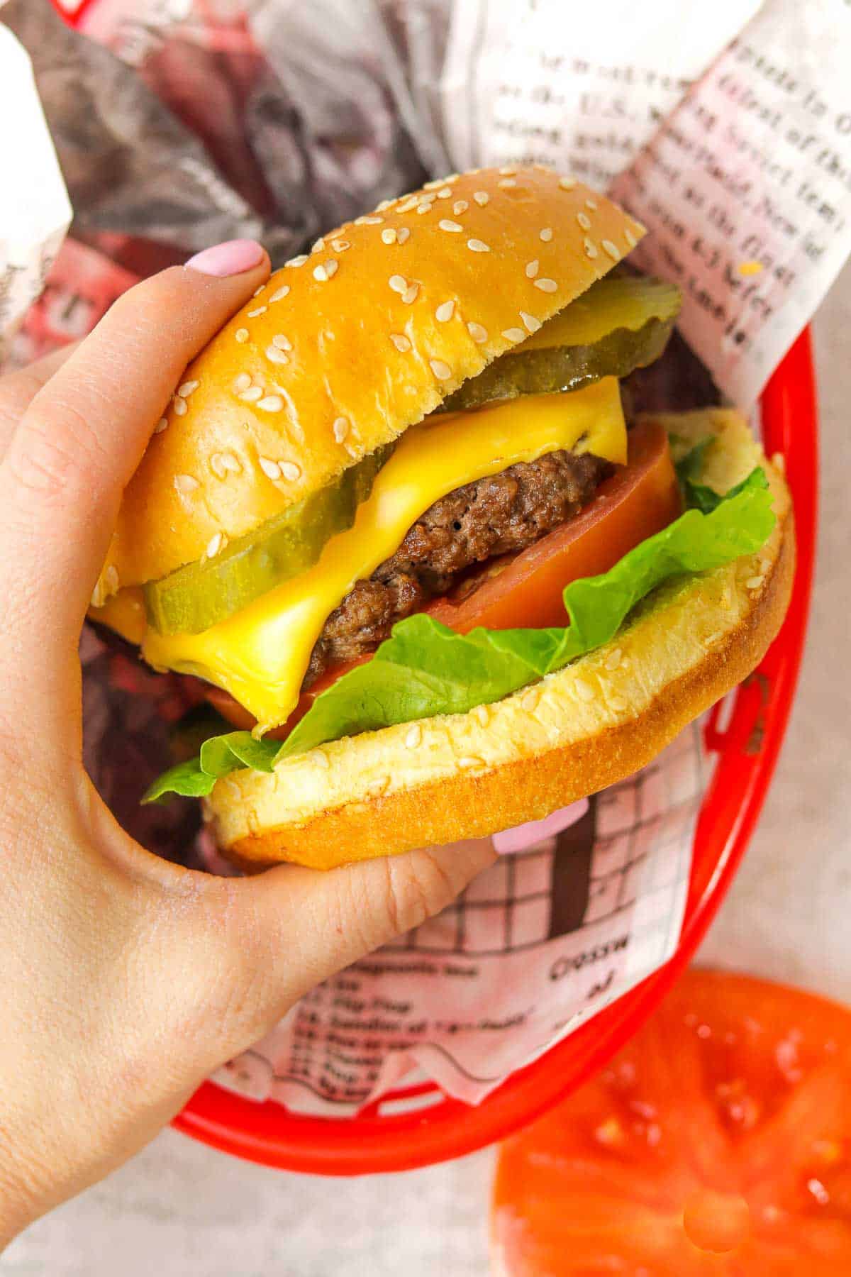 air fryer burger patty in a basket