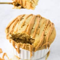 eating peanut butter protein mug cake with spoon