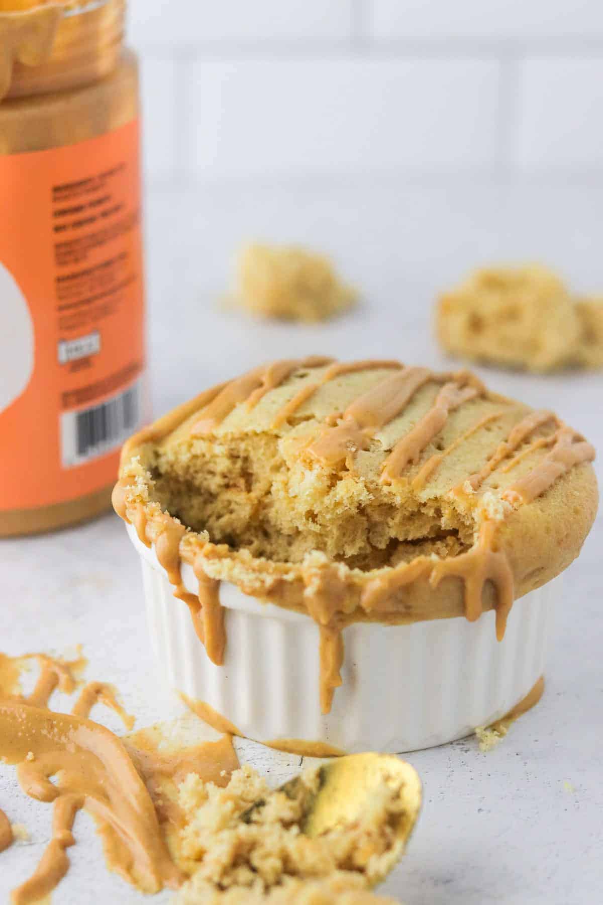 peanut butter protein mug cake on coounter