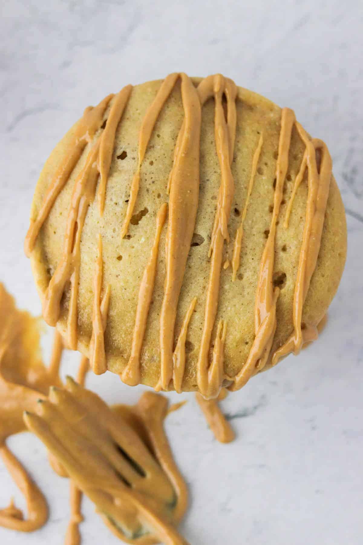 peanut butter protein mug cake with peanut butter