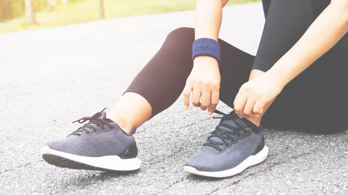 a woman trying her running shoes.