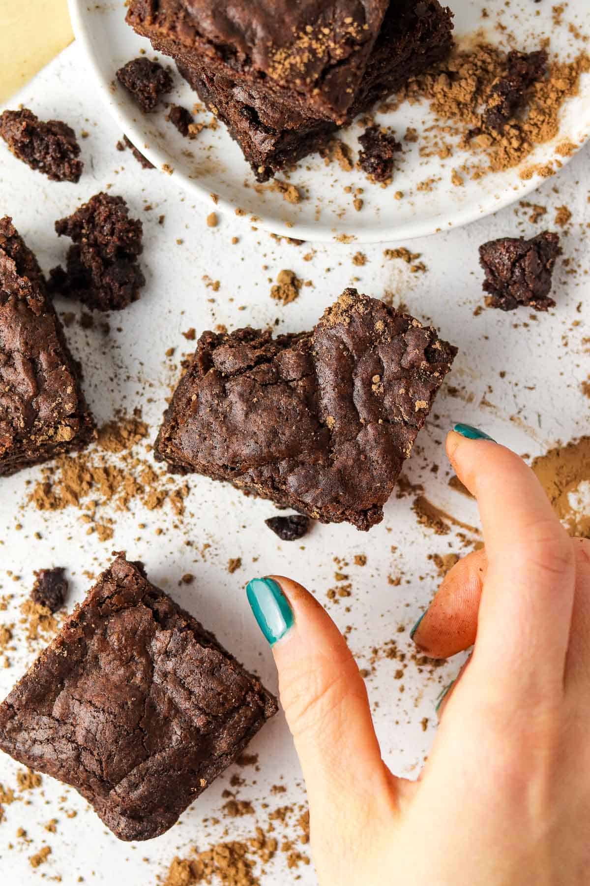 Grabbing an air fryer brownie on the counter.