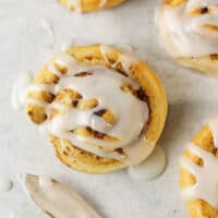 air fryer cinnamon roll sitting on the counter.