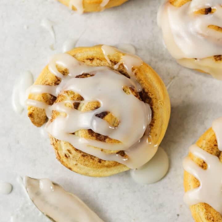 air fryer cinnamon roll sitting on the counter.
