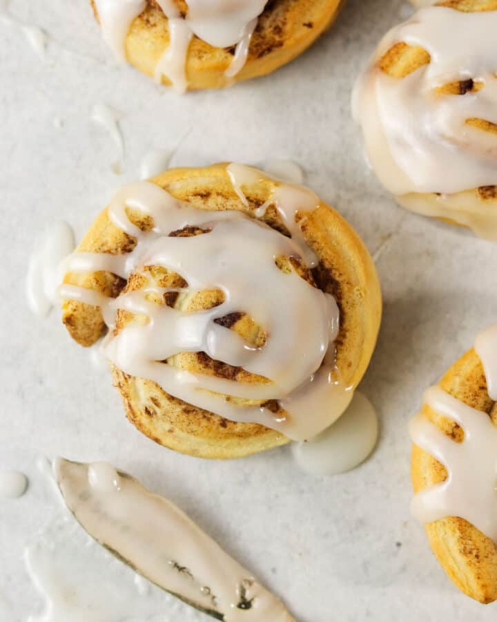 air fryer cinnamon roll sitting on the counter.
