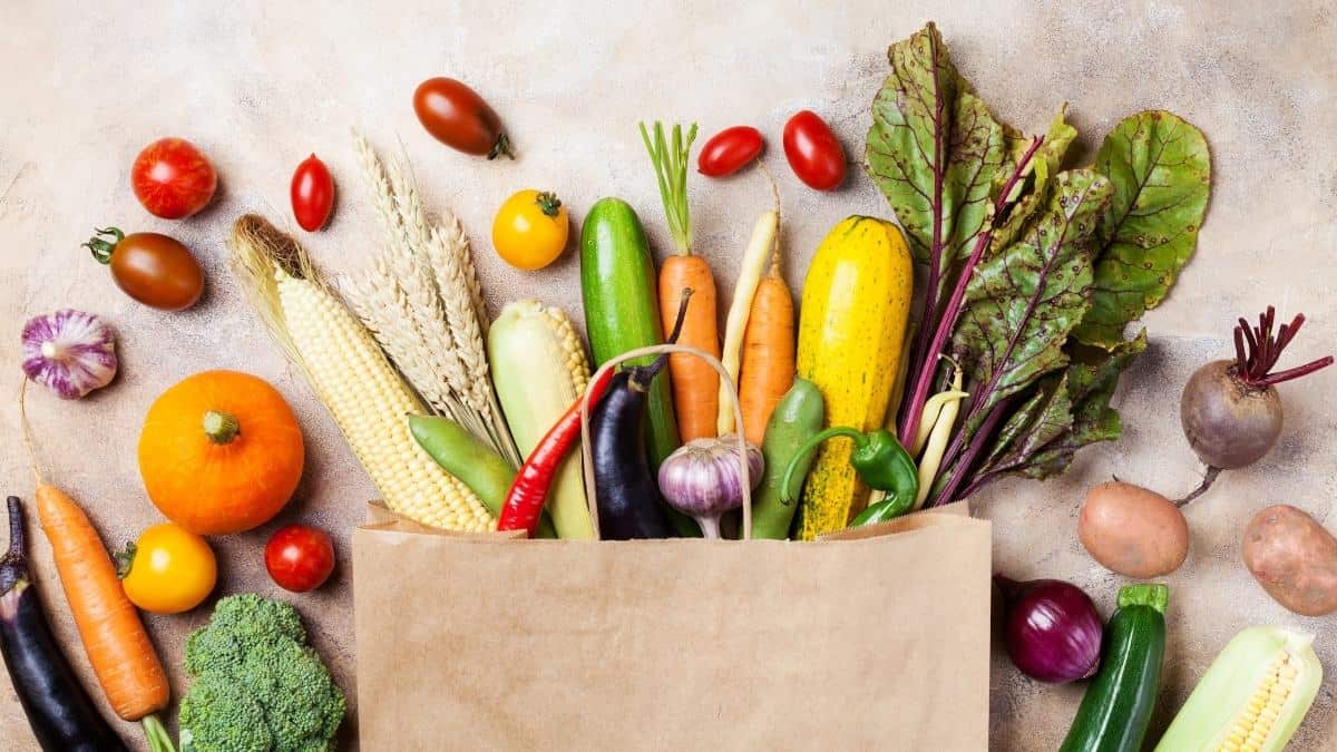 Whole foods coming out of a grocery bag.