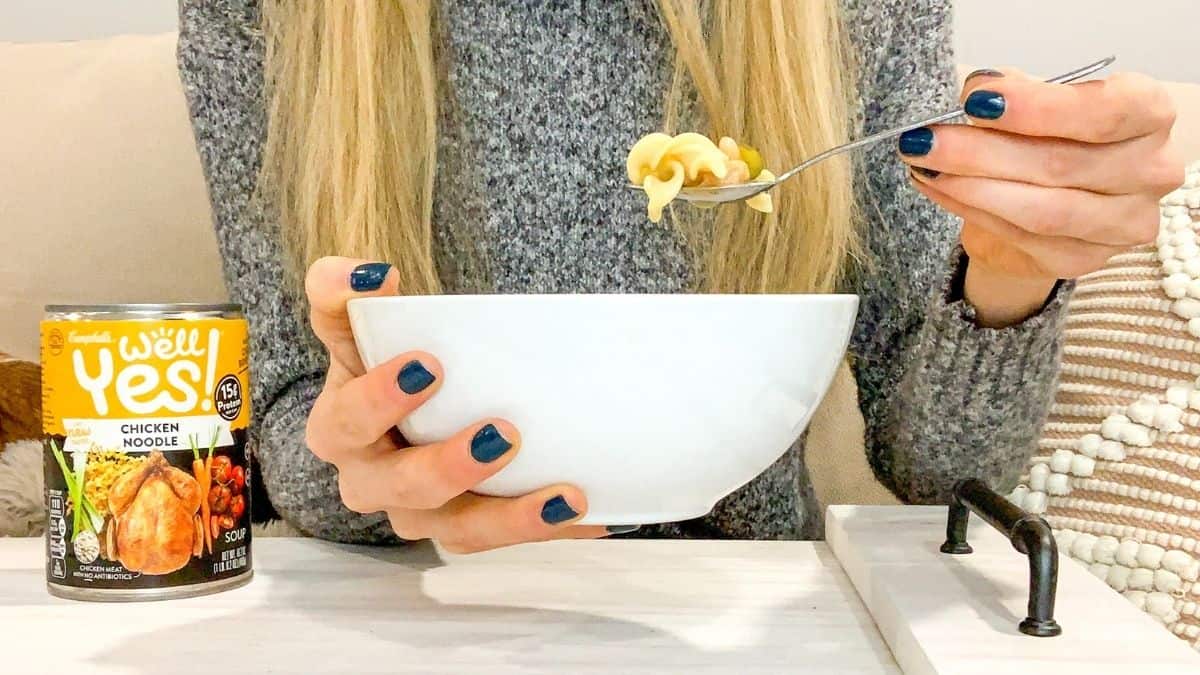 Eating a bowl of well YES! Chicken Noodle Soup when you are sick.