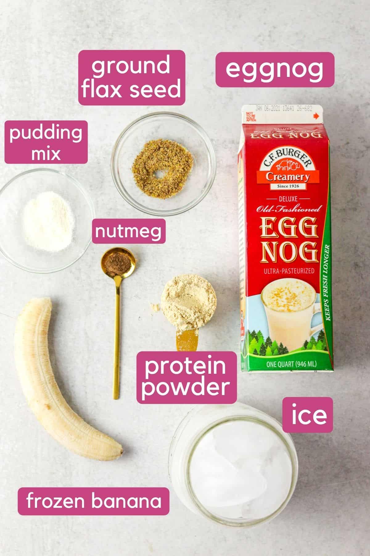 Eggnog smoothie ingredients on the counter labeled.