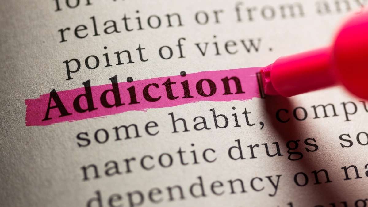 Dictionary defenition of addicition being highlighted in pink.