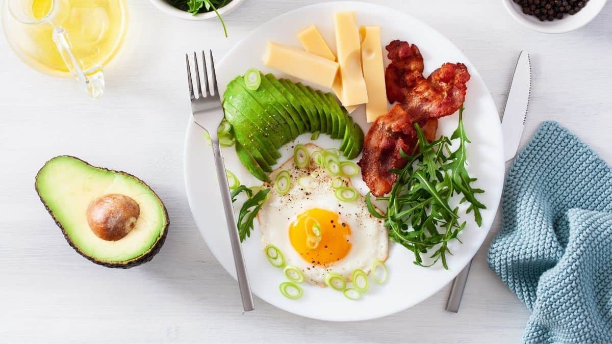 A plate of low carb food with a fork.