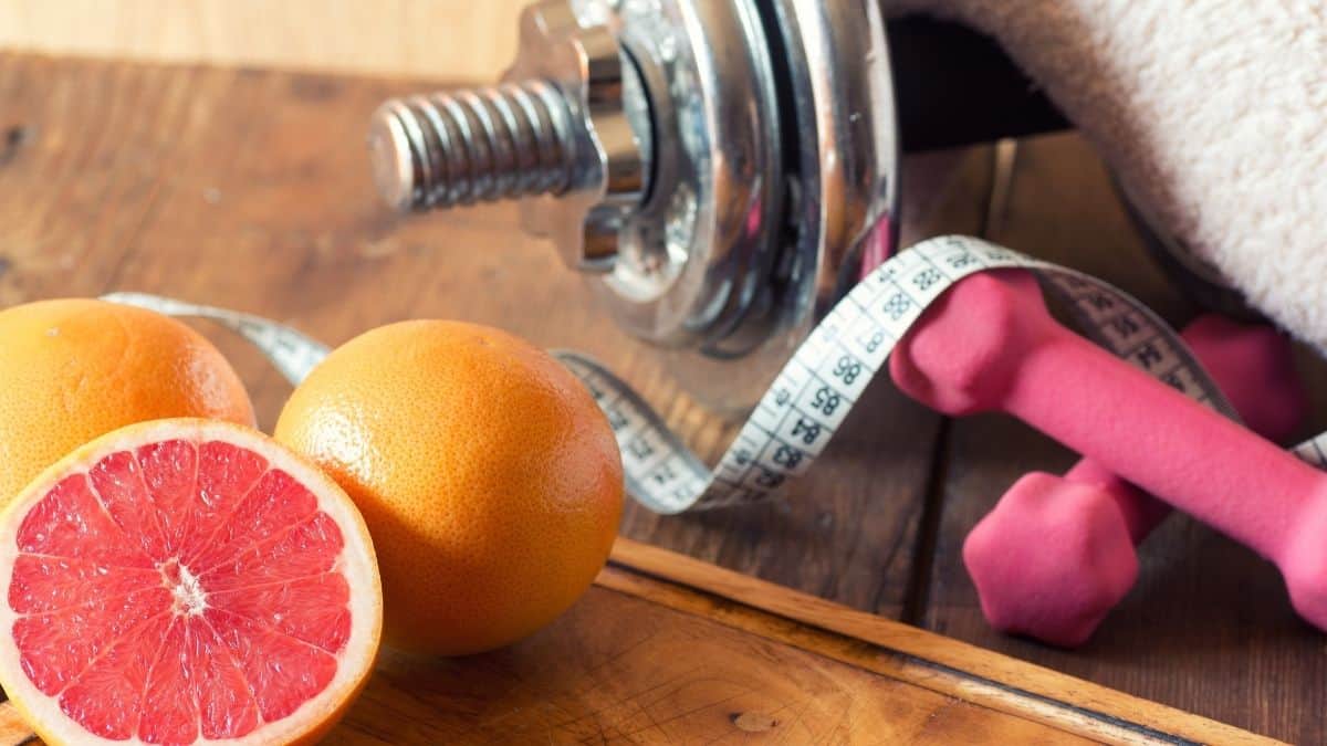 grapefruit and weights with a tape measure.