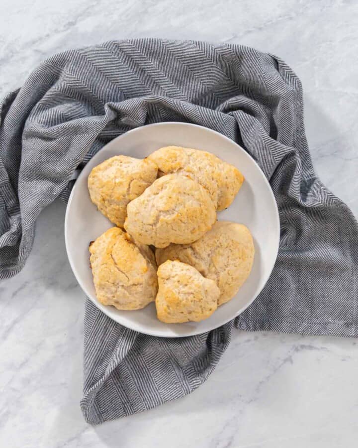 3 ingredient scones on a plate with a gray napkin.