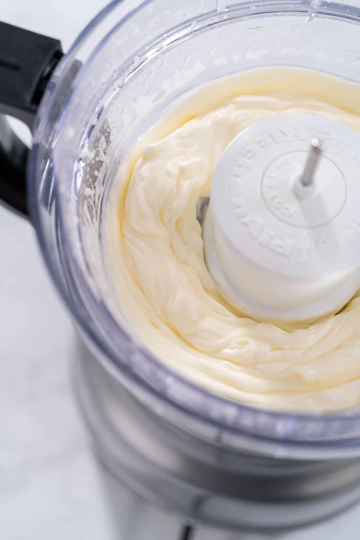 Whole egg mayo in a food processor.