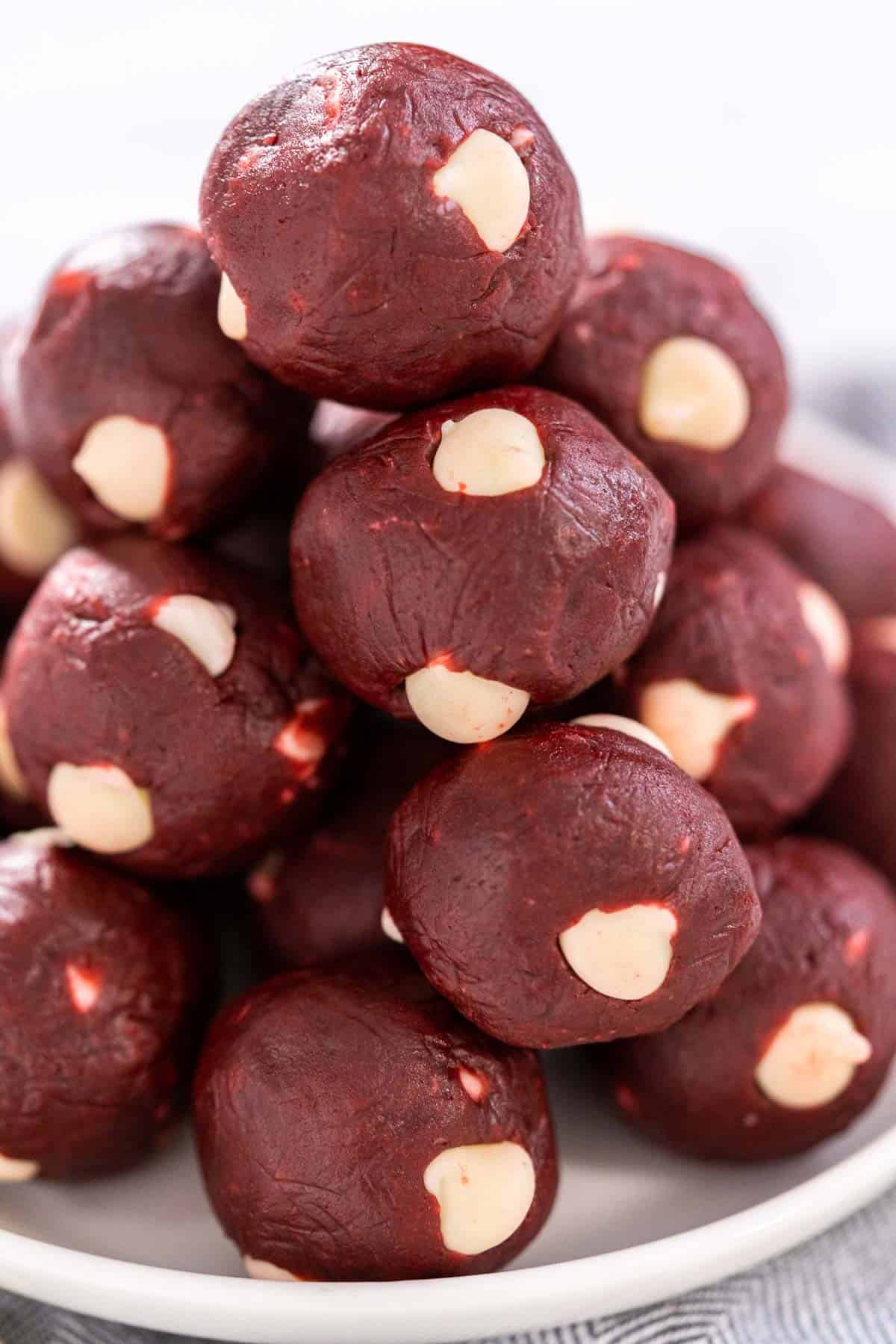 A stack of red velvet cookie dough bites.