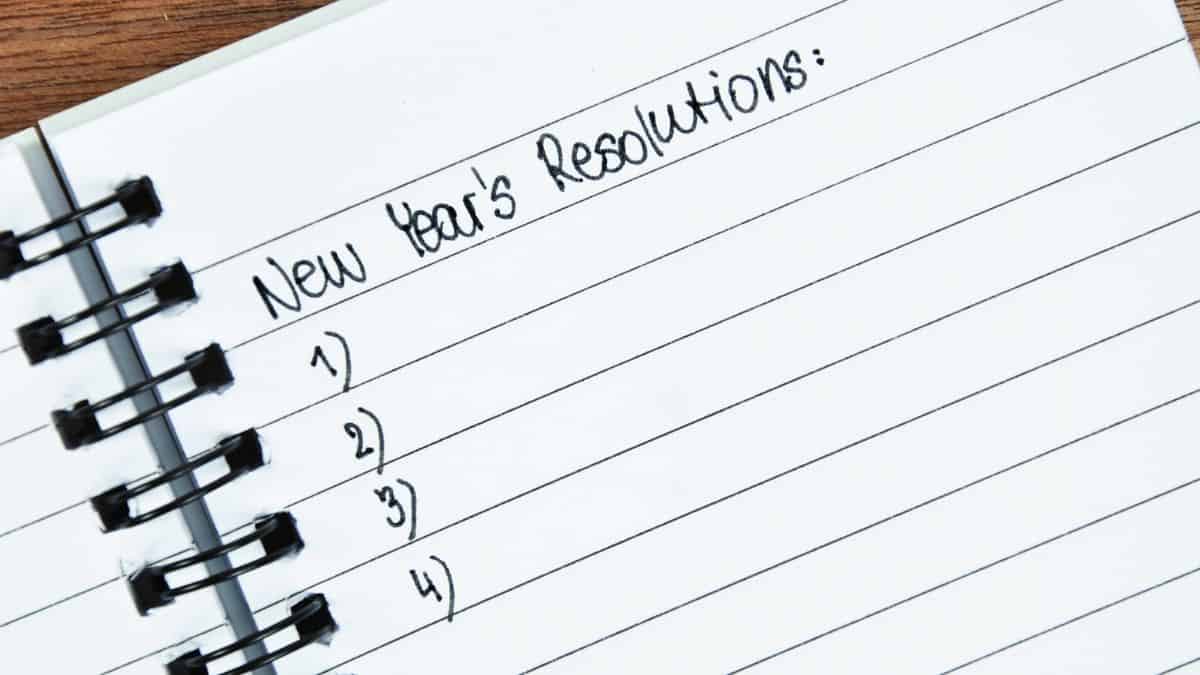 a piece of paper ready to write down non-weight loss new years resolutions.