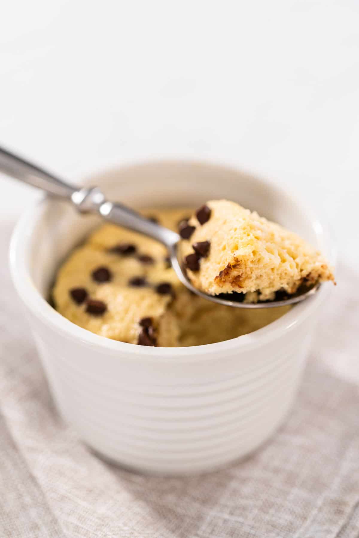 A spoonful of chocolate chip protein baked oats.