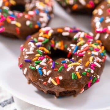 A plate of protein donuts with sprinkles