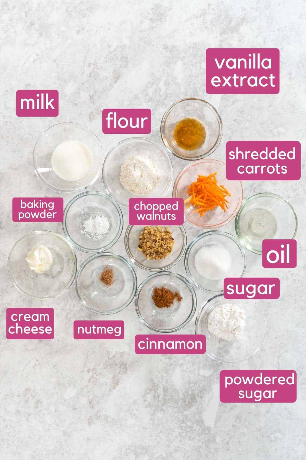 An overhead view of ingredients needed to make a single serve carrot cake. Includes flour, shredded carrot, walnuts, and oil.