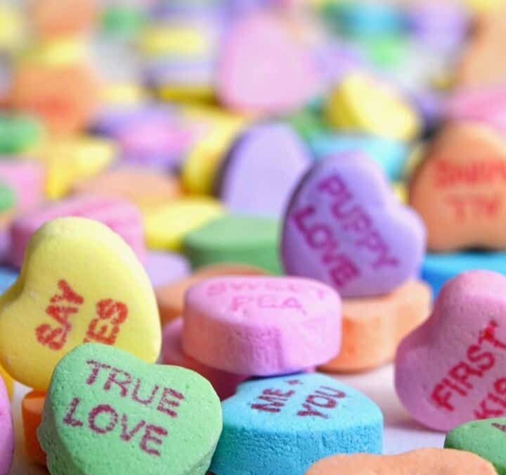 pile of heart shaped candies.