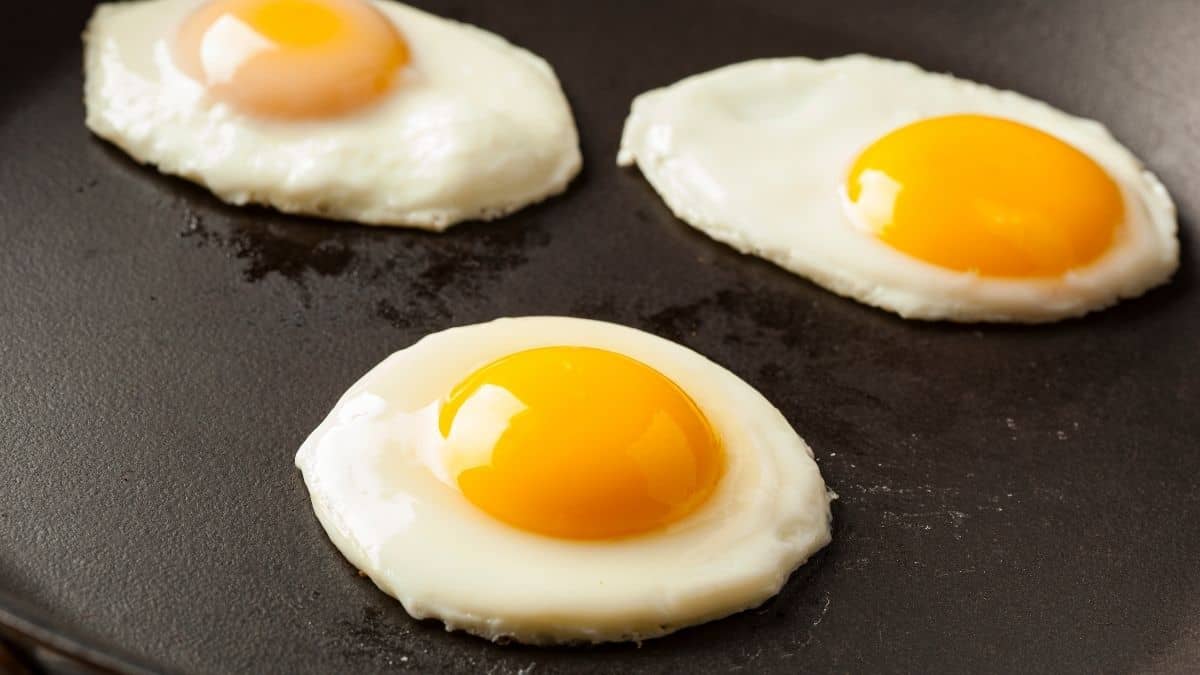 eggs sunnyside up on grill.