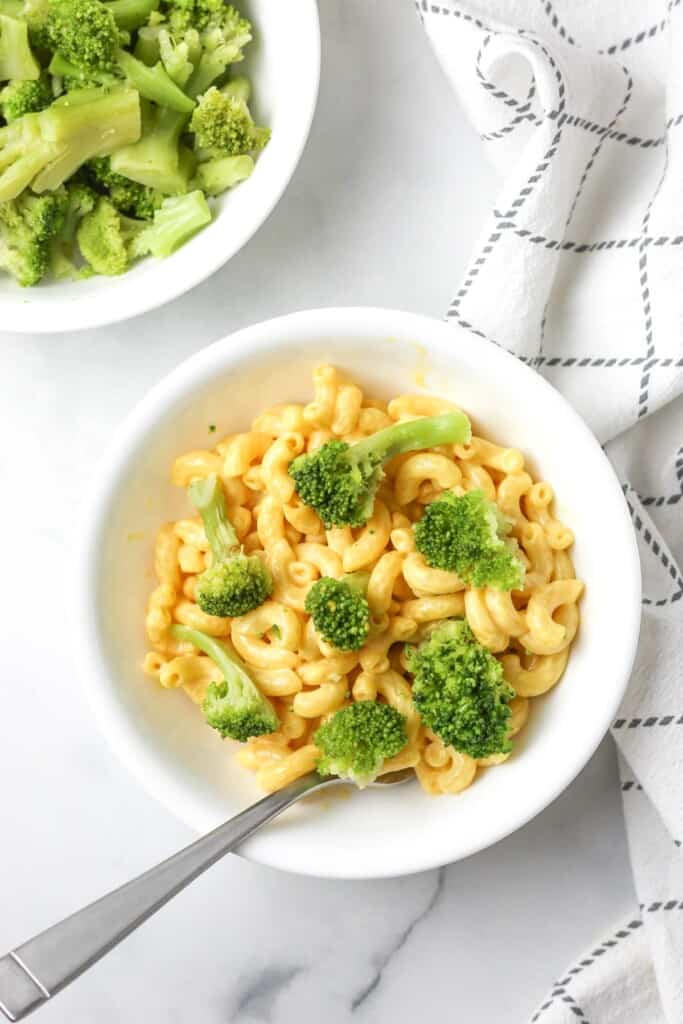 bowl of mac and cheese and broccoli.
