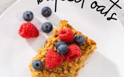 A square of baked oatmeal topped with fruit.