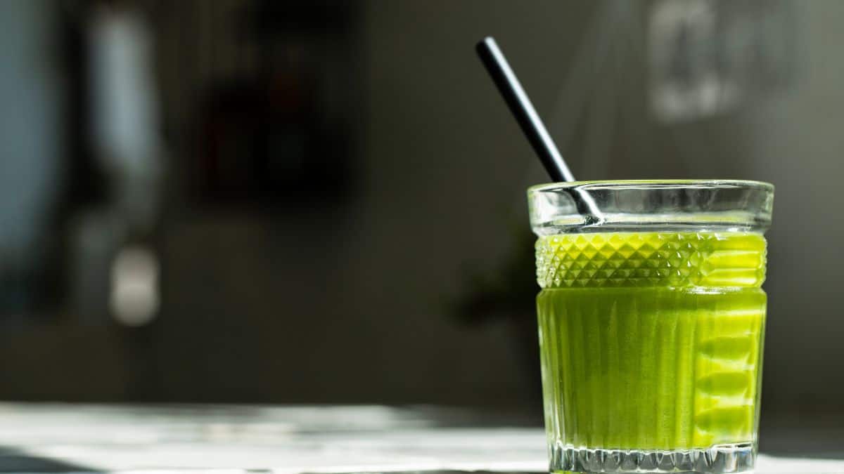 crystal glass with athletic green juice.