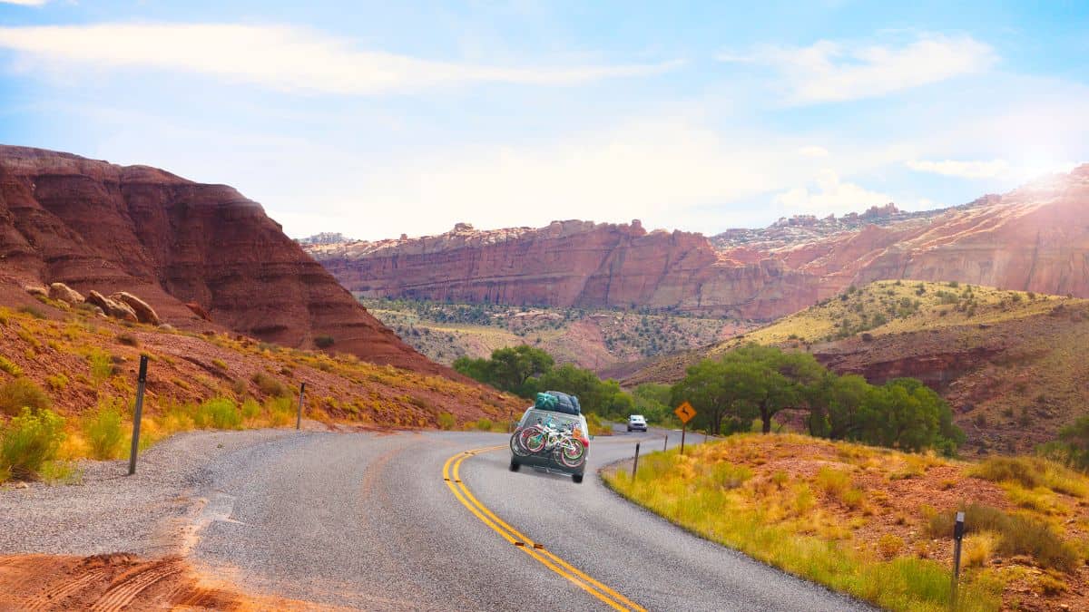 a van on a road trip through the mountains.